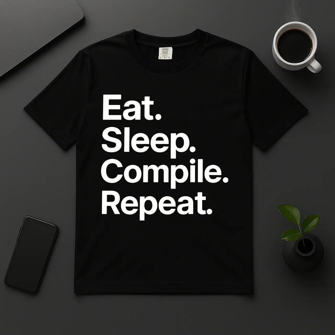 Funny programmer t-shirt with text Eat Sleep Compile Repeat in bold font black cotton tee